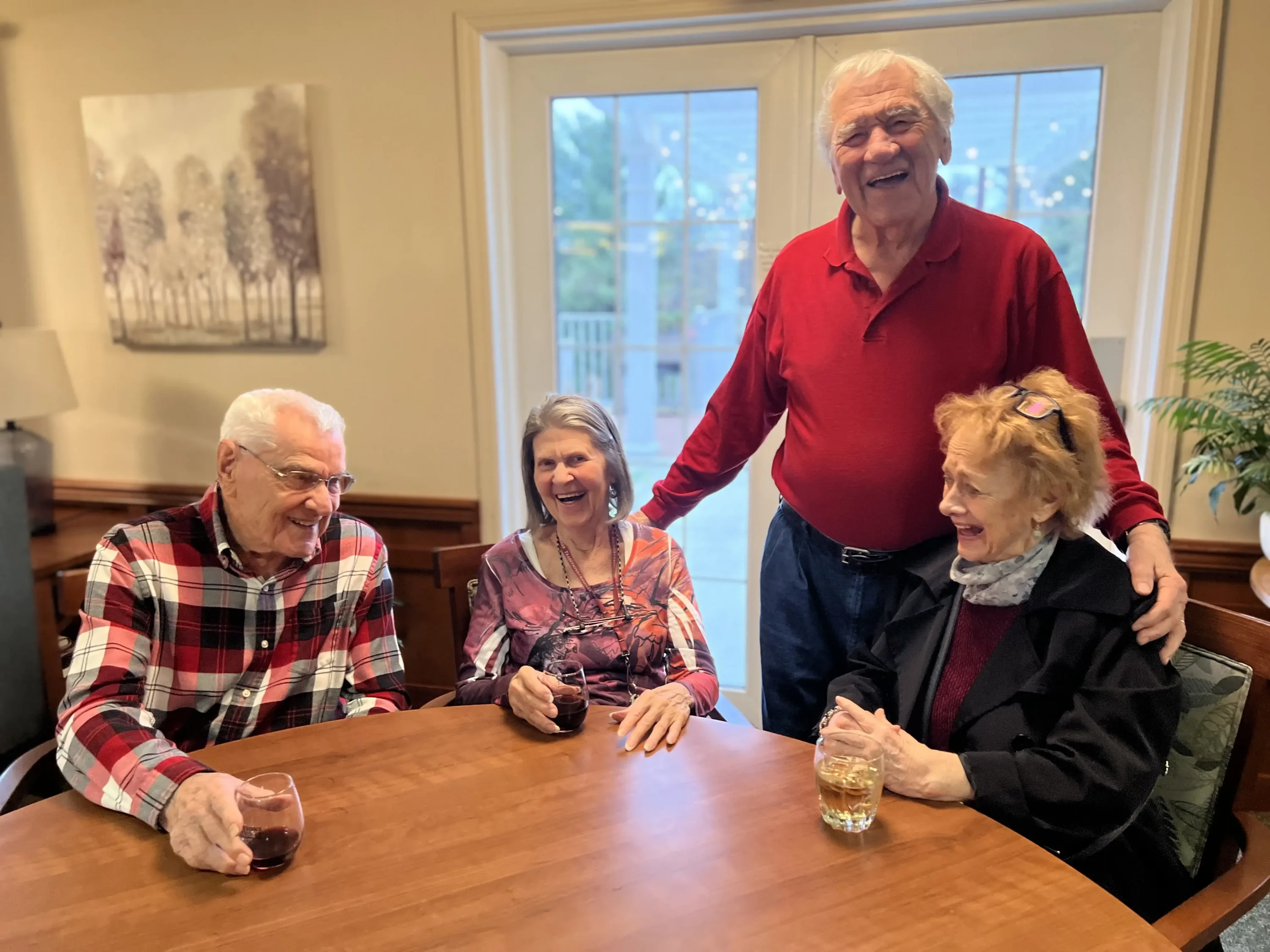 img for the amenities section with 4 seniors having a good time